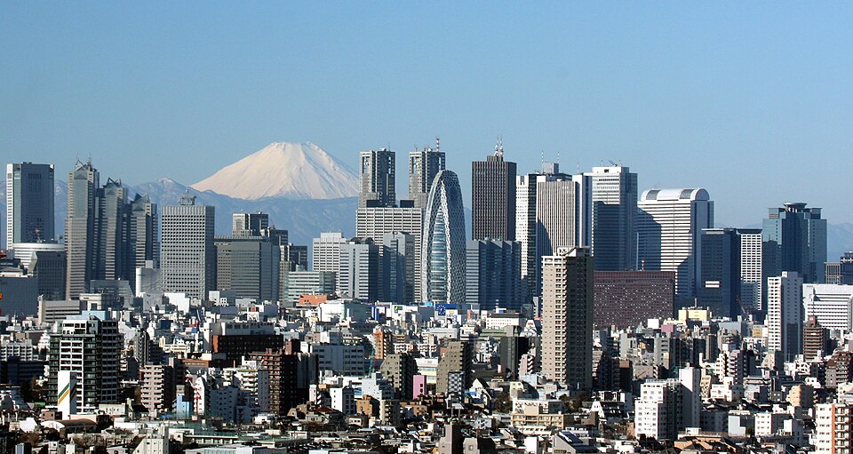 The Shinjuku skyline in Tokyo with Mount Fuji behind