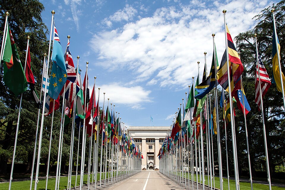 A row of national flags outside the United Nations in Geneva